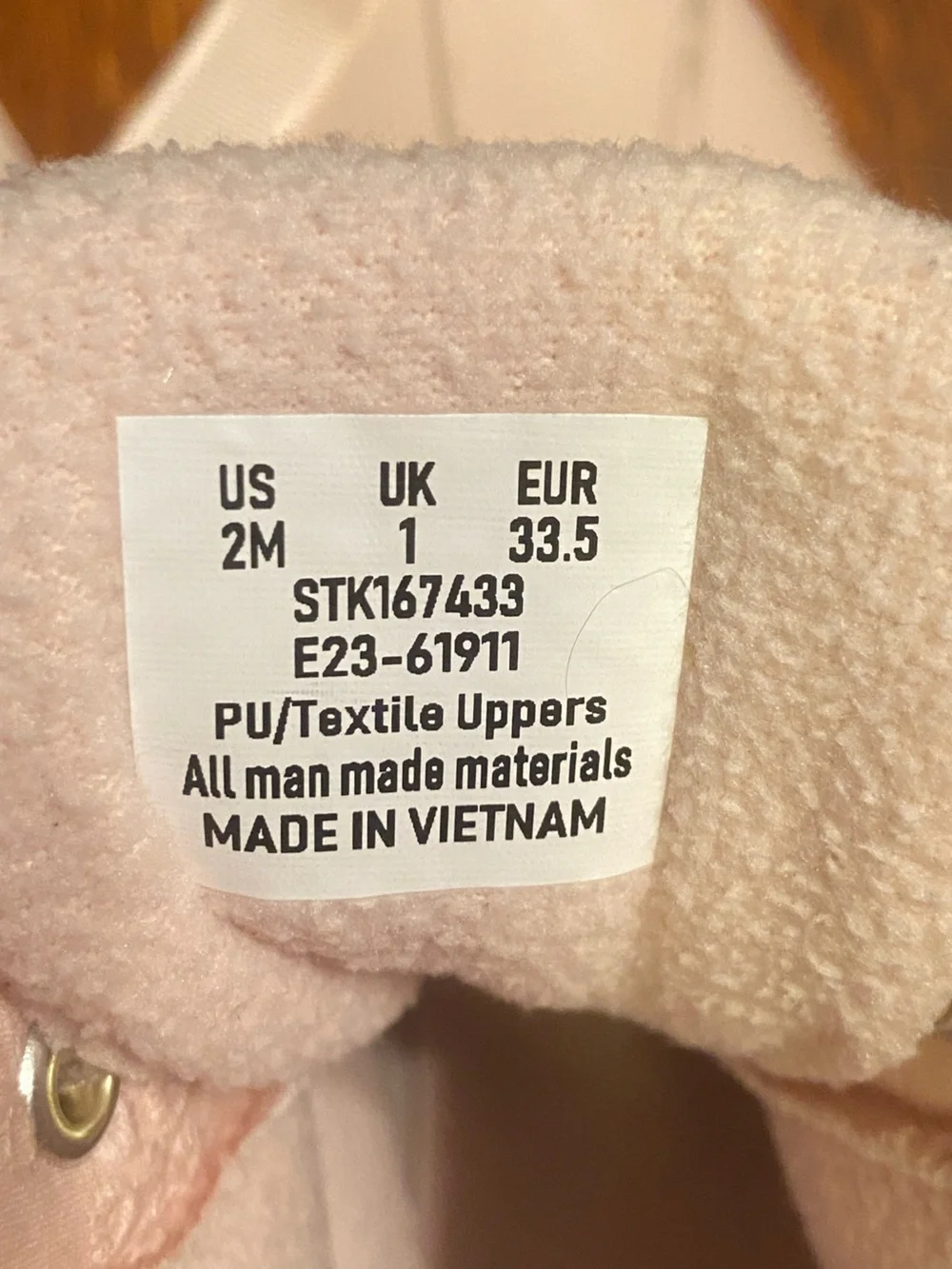 Sperry Girls powder pink lace-up all weather duck boots.